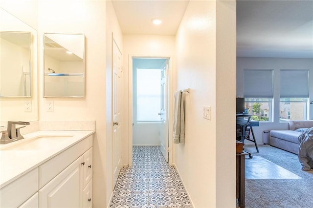 7155 Citrus Ave Unit 367, Fontana, CA 92336 - bathroom featuring vanity, baseboards, recessed lighting, and tile patterned floors