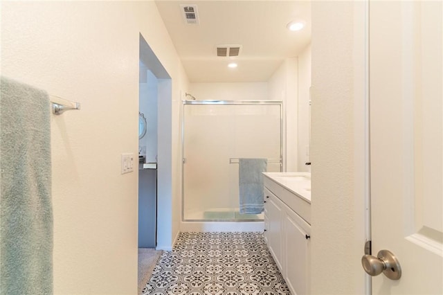 7155 Citrus Ave Unit 367, Fontana, CA 92336 - full bathroom featuring a shower stall, vanity, tile patterned flooring, and recessed lighting