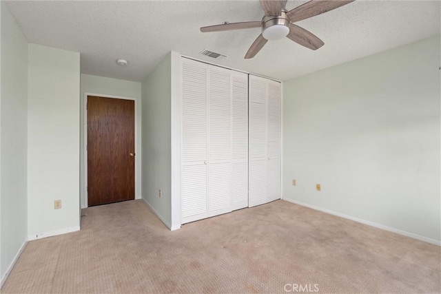 9 Coolwater, Chico, CA 95928 - unfurnished bedroom with carpet flooring, a closet, baseboards, and a textured ceiling