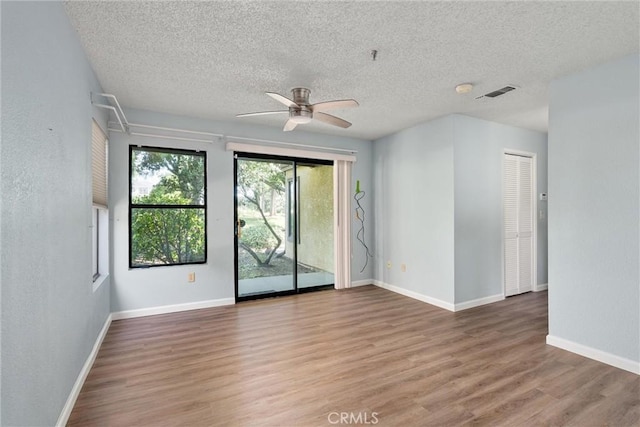 9 Coolwater, Chico, CA 95928 - spare room with a ceiling fan, wood finished floors, a textured ceiling, and baseboards