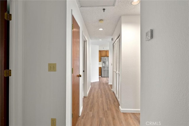 9 Coolwater, Chico, CA 95928 - hall with light wood-style flooring, baseboards, and recessed lighting