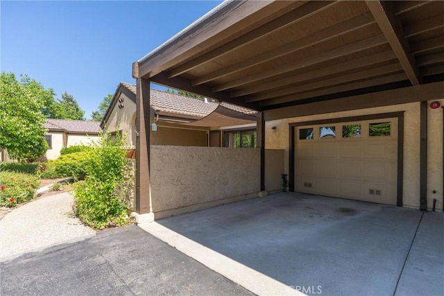 9 Coolwater, Chico, CA 95928 - view of side of property with stucco siding and driveway