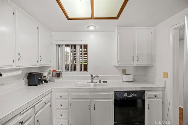 5359 Algarrobo Unit 1A, Laguna Woods, CA 92637 - kitchen featuring dishwasher, a sink, and white cabinets