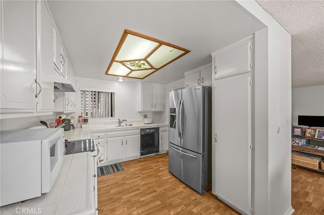 5359 Algarrobo Unit 1A, Laguna Woods, CA 92637 - kitchen with stainless steel refrigerator with ice dispenser, dishwasher, a sink, white cabinets, and light wood finished floors
