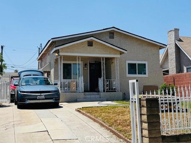 2037 S 3rd St, Alhambra, CA 91803 - view of front of home with stucco siding and covered porch