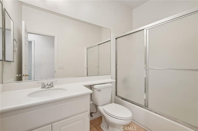 28523 Santa Catarina Rd, Saugus, CA 91350 - full bath featuring toilet, vanity, enclosed tub / shower combo, and tile patterned floors