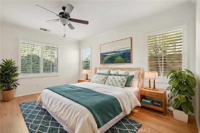 28523 Santa Catarina Rd, Saugus, CA 91350 - bedroom featuring wood finished floors, crown molding, ceiling fan, and baseboards