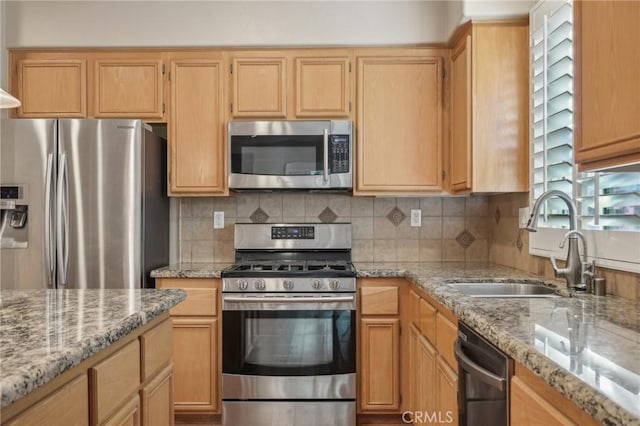 28523 Santa Catarina Rd, Saugus, CA 91350 - kitchen with appliances with stainless steel finishes, a sink, backsplash, and light stone countertops