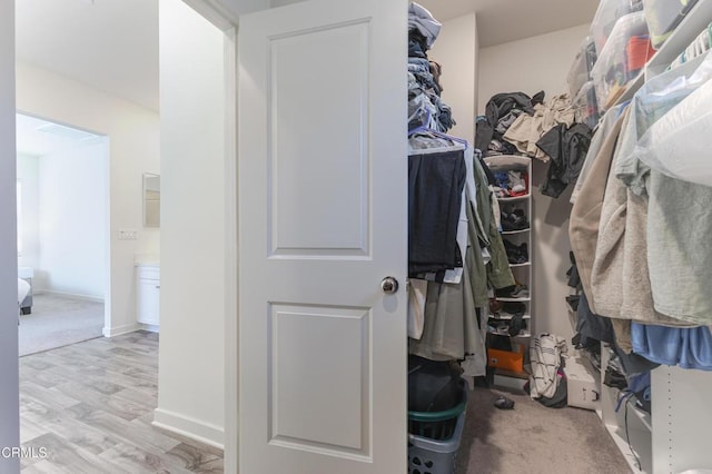 1607 Dundas Pl, Upland, CA 91784 - walk in closet with wood finished floors