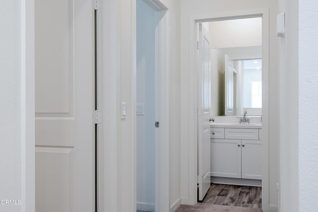 1607 Dundas Pl, Upland, CA 91784 - bathroom with vanity and wood finished floors