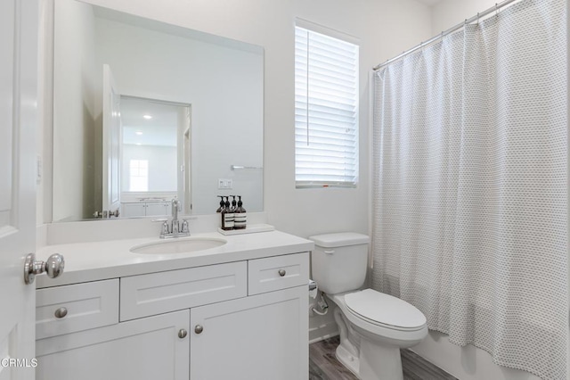 1607 Dundas Pl, Upland, CA 91784 - bathroom featuring vanity, toilet, and wood finished floors