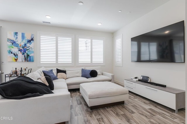 1607 Dundas Pl, Upland, CA 91784 - living area with light wood-style floors and recessed lighting