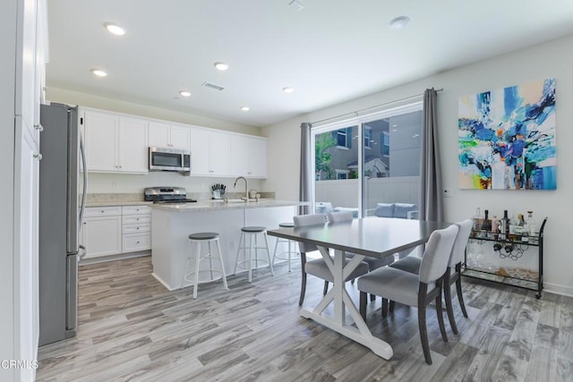 1607 Dundas Pl, Upland, CA 91784 - dining space featuring light wood-type flooring and recessed lighting