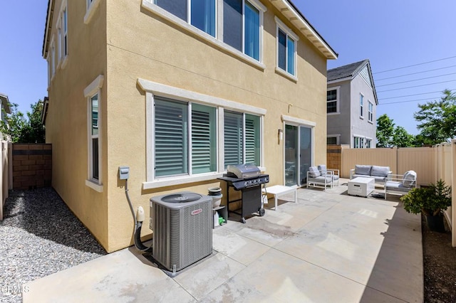 1607 Dundas Pl, Upland, CA 91784 - fenced backyard featuring central air condition unit, an outdoor living space, a patio area, and grilling area