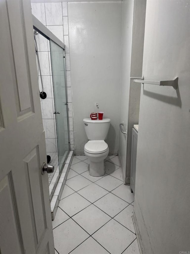 704 J St, Chula Vista, CA 91910 - full bathroom with toilet, a stall shower, and tile patterned flooring
