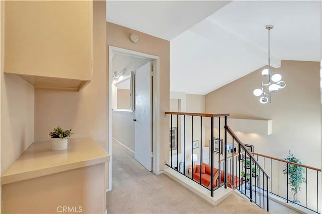 14096 Baker St, Westminster, CA 92683 - hall featuring light colored carpet, a chandelier, and an upstairs landing