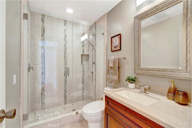 14096 Baker St, Westminster, CA 92683 - bathroom with toilet, vanity, a stall shower, and recessed lighting