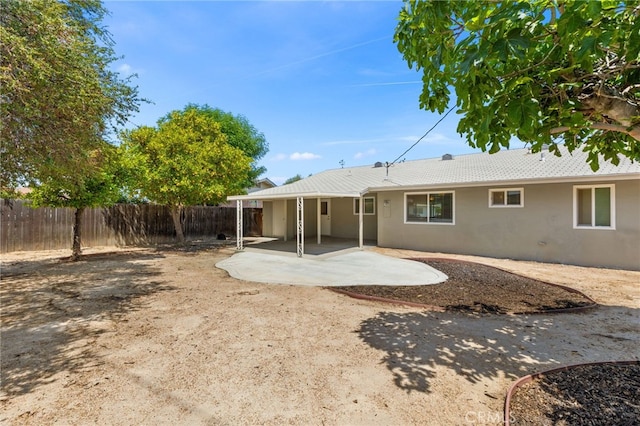 26331 Foxgrove Rd, Menifee, CA 92586 - back of house with a patio, a fenced backyard, and stucco siding