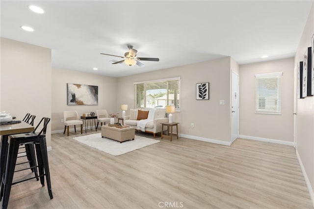 26331 Foxgrove Rd, Menifee, CA 92586 - living room featuring light wood finished floors, baseboards, and recessed lighting