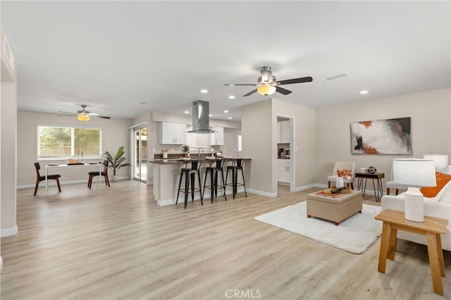 26331 Foxgrove Rd, Menifee, CA 92586 - living room featuring ceiling fan, baseboards, light wood-type flooring, and recessed lighting