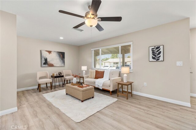 26331 Foxgrove Rd, Menifee, CA 92586 - living room with light wood-style flooring, baseboards, a ceiling fan, and recessed lighting