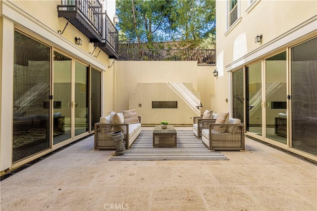 51 Dunmore, Irvine, CA 92620 - view of patio featuring an outdoor hangout area and a balcony
