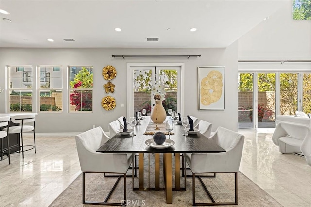 51 Dunmore, Irvine, CA 92620 - dining area featuring light marble finish flooring, recessed lighting, and baseboards