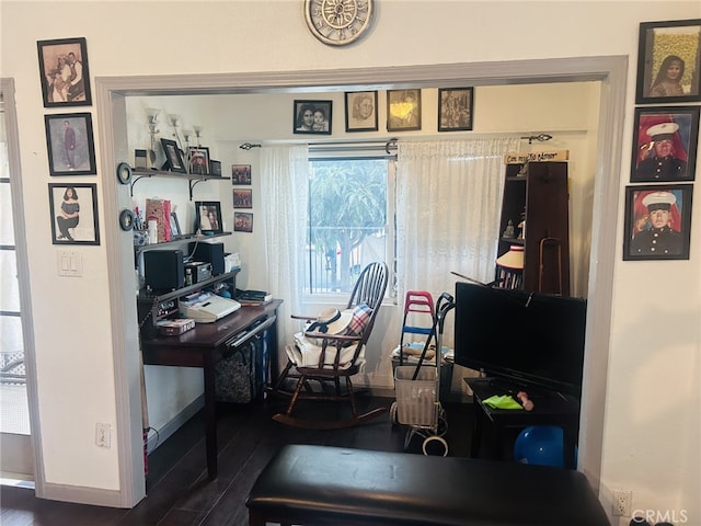 15160 Pimenta Ave, Paramount, CA 90723 - home office featuring wood finished floors and baseboards