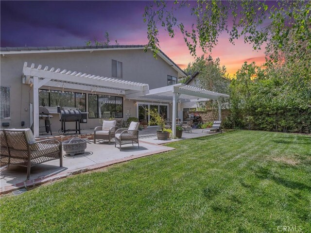 23403 Via Castanet, Valencia, CA 91355 - back of house with a pergola, a patio, an outdoor living space with a fire pit, and stucco siding