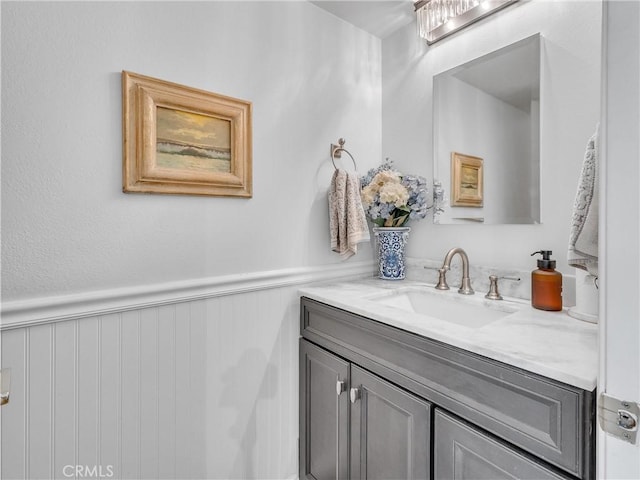 23403 Via Castanet, Valencia, CA 91355 - bathroom featuring vanity and wainscoting