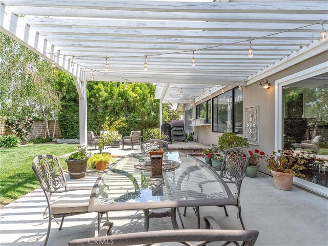 23403 Via Castanet, Valencia, CA 91355 - view of patio / terrace with a pergola and outdoor dining space