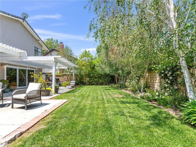 23403 Via Castanet, Valencia, CA 91355 - view of yard with a pergola and a patio area