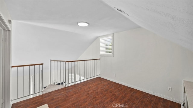 10133 Shinon Dr, Rancho Cucamonga, CA 91737 - bonus room featuring lofted ceiling, wood finished floors, and baseboards