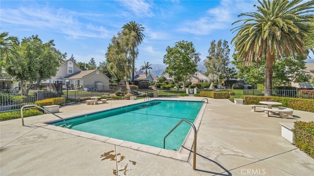 10133 Shinon Dr, Rancho Cucamonga, CA 91737 - community pool with a residential view and a patio area