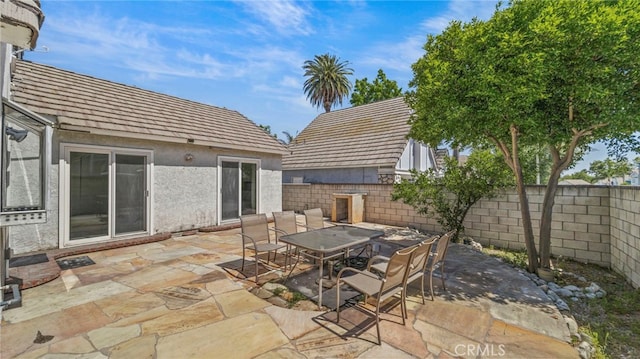 10133 Shinon Dr, Rancho Cucamonga, CA 91737 - fenced backyard with outdoor dining area and a patio