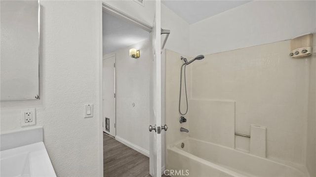 10133 Shinon Dr, Rancho Cucamonga, CA 91737 - full bath featuring shower / bath combination and wood finished floors