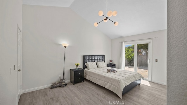 10133 Shinon Dr, Rancho Cucamonga, CA 91737 - bedroom with access to outside, a chandelier, high vaulted ceiling, wood finished floors, and baseboards