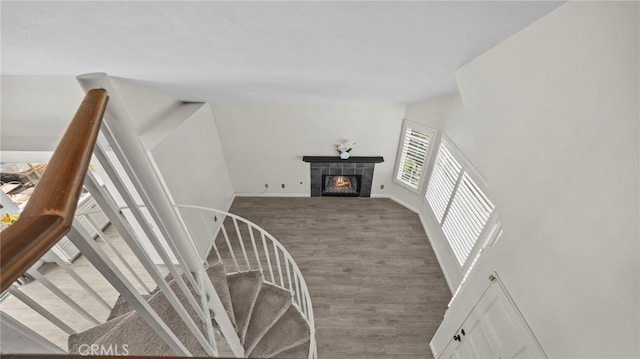 10133 Shinon Dr, Rancho Cucamonga, CA 91737 - staircase featuring wood finished floors and a tile fireplace