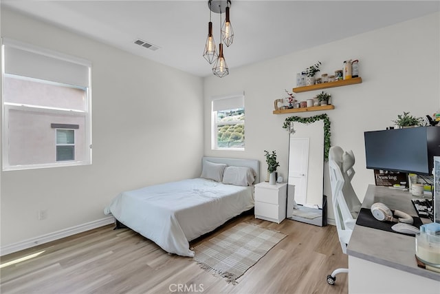 2760 Chad Zeller Ln, Corona, CA 92882 - bedroom with light wood finished floors and baseboards