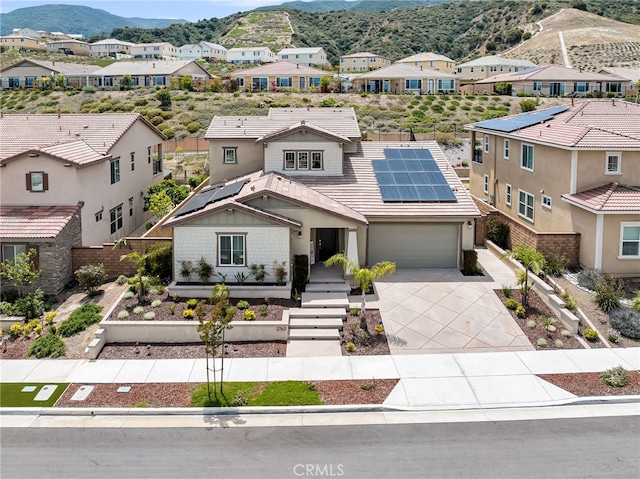 2760 Chad Zeller Ln, Corona, CA 92882 - view of front of property with a mountain view, solar panels, driveway, a residential view, and a tiled roof