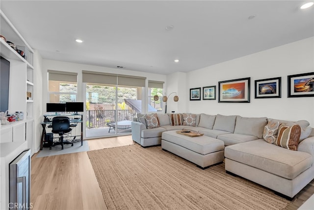 2760 Chad Zeller Ln, Corona, CA 92882 - living room featuring an office area, wood finished floors, healthy amount of natural light, recessed lighting, and wine cooler
