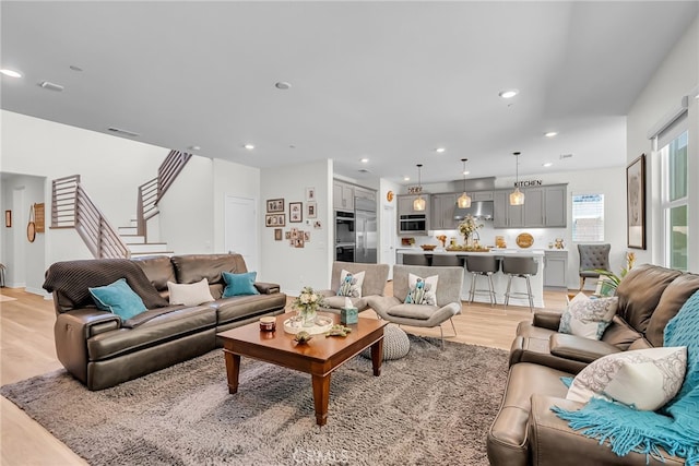 2760 Chad Zeller Ln, Corona, CA 92882 - living area featuring light wood-style floors, stairs, and recessed lighting