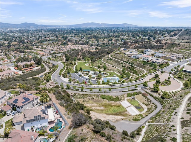 2760 Chad Zeller Ln, Corona, CA 92882 - aerial view of property's location featuring a mountain backdrop and nearby suburban area
