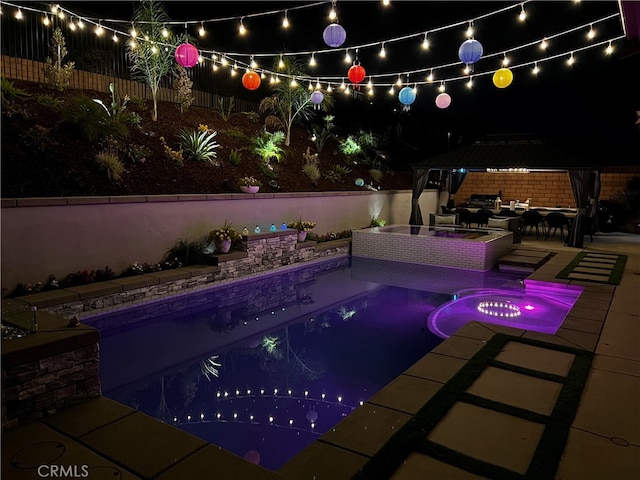 2760 Chad Zeller Ln, Corona, CA 92882 - pool at twilight with a gazebo, a fenced backyard, and a patio area