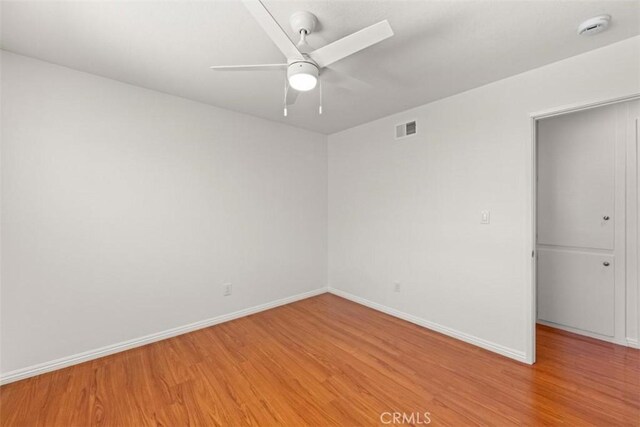 3275 Dalhart Ave, Simi Valley, CA 93063 - empty room featuring light wood-style floors, a smoke detector, baseboards, and ceiling fan
