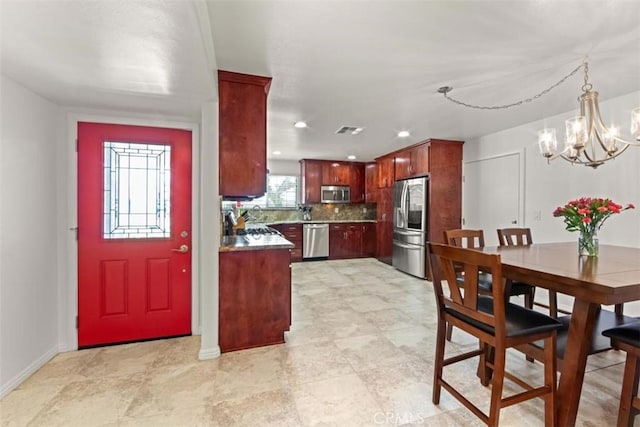 3275 Dalhart Ave, Simi Valley, CA 93063 - dining area featuring a chandelier, baseboards, and recessed lighting