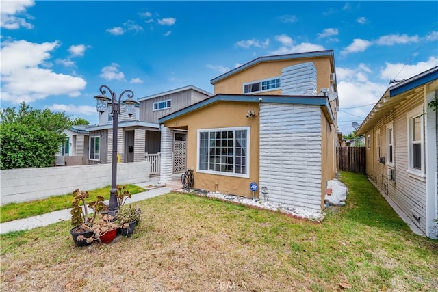 727 W Hill St, Long Beach, CA 90806 - back of house featuring stucco siding