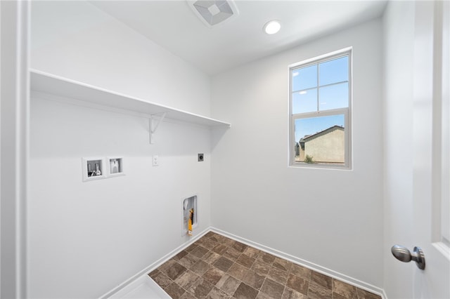 29562 Winterstorm Ct, Winchester, CA 92596 - laundry area featuring baseboards, hookup for an electric dryer, hookup for a washing machine, and stone finish flooring