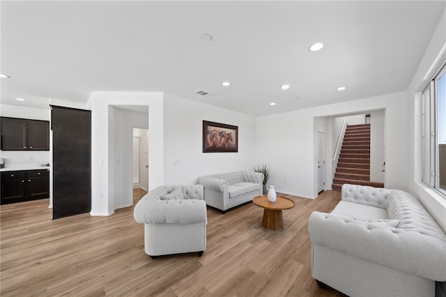 29562 Winterstorm Ct, Winchester, CA 92596 - living room with stairs, recessed lighting, light wood-type flooring, and baseboards