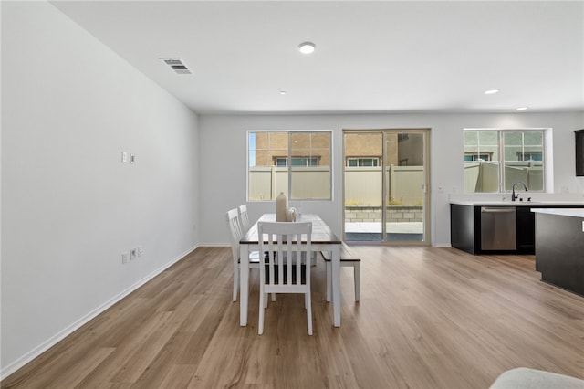 29562 Winterstorm Ct, Winchester, CA 92596 - dining area featuring light wood-style flooring, plenty of natural light, baseboards, and recessed lighting